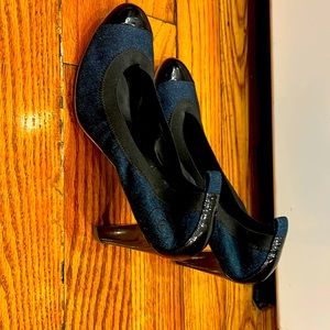 Navy Chanel heels with black patent toe and heels